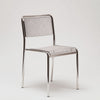 Metal chair with mesh back on a white background